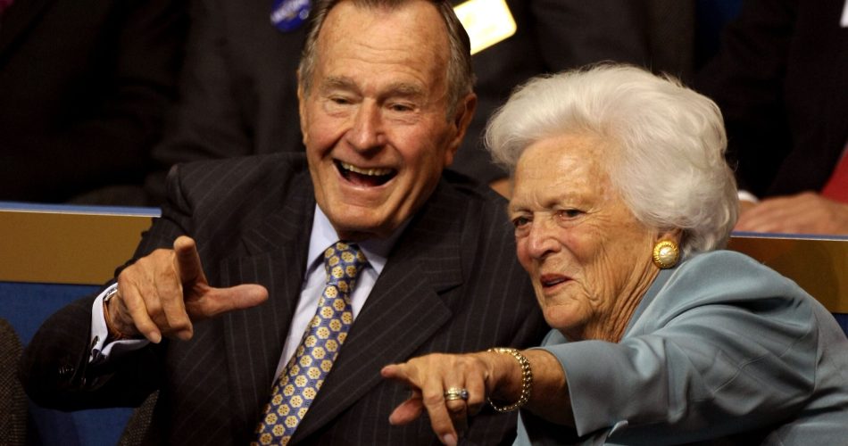 ST. PAUL, MN - SEPTEMBER 02: Former President George H.W. Bush (L) and former first lady Barbara Bush (C) point from their seats on day two of the Republican National Convention (RNC) at the Xcel Energy Center on September 2, 2008 in St. Paul, Minnesota. The GOP will nominate U.S. Sen. John McCain (R-AZ) as the Republican choice for U.S. President on the last day of the convention. (Photo by Justin Sullivan/Getty Images)