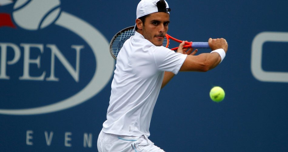 epa06864246 Thomas Fabbiano of Italy returns to Stan Wawrinka of Switzerland in their second round match during the Wimbledon Championships at the All England Lawn Tennis Club, in London, Britain, 04 July 2018. EPA/NIC BOTHMA EDITORIAL USE ONLY/NO COMMERCIAL SALES