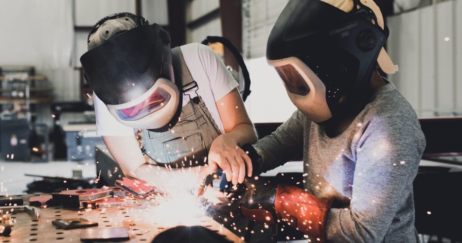 a-female-welder-teaches-a-child-how-to-weld-meta-2026-01-05-00-30-50-utc (1)