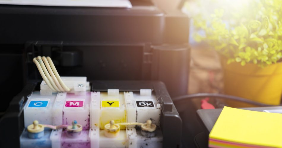 The printer is fully functional,Located on the desk. Ink tank that looks smeared in ink
